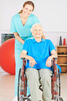 Caregiver assisting the elderly woman